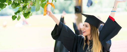 This is an image of a woman who is happy because she has just graduated and received her certificate.