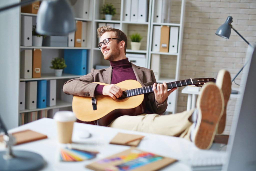 A man is playing guitar.